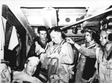 Robert Sherrod Dons Parachute