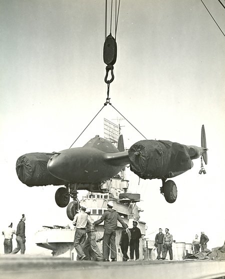 Loading P-38 on USS Ranger, 1944